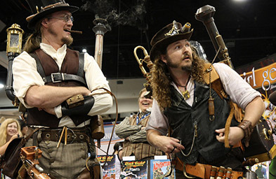 Picture of two steampunk cosplayers wearing chimneys and contraptions